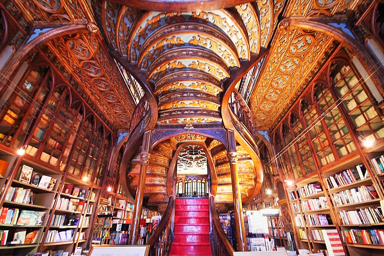 Livraria Lello iconic neo-Gothic bookshop with ornate wooden staircase in Porto Portugal